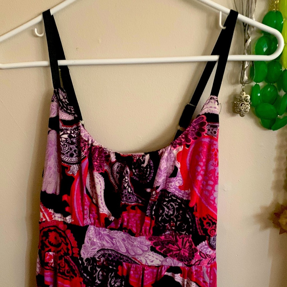 Long spaghetti strap maxi dress. Variations of pink and purple in color.